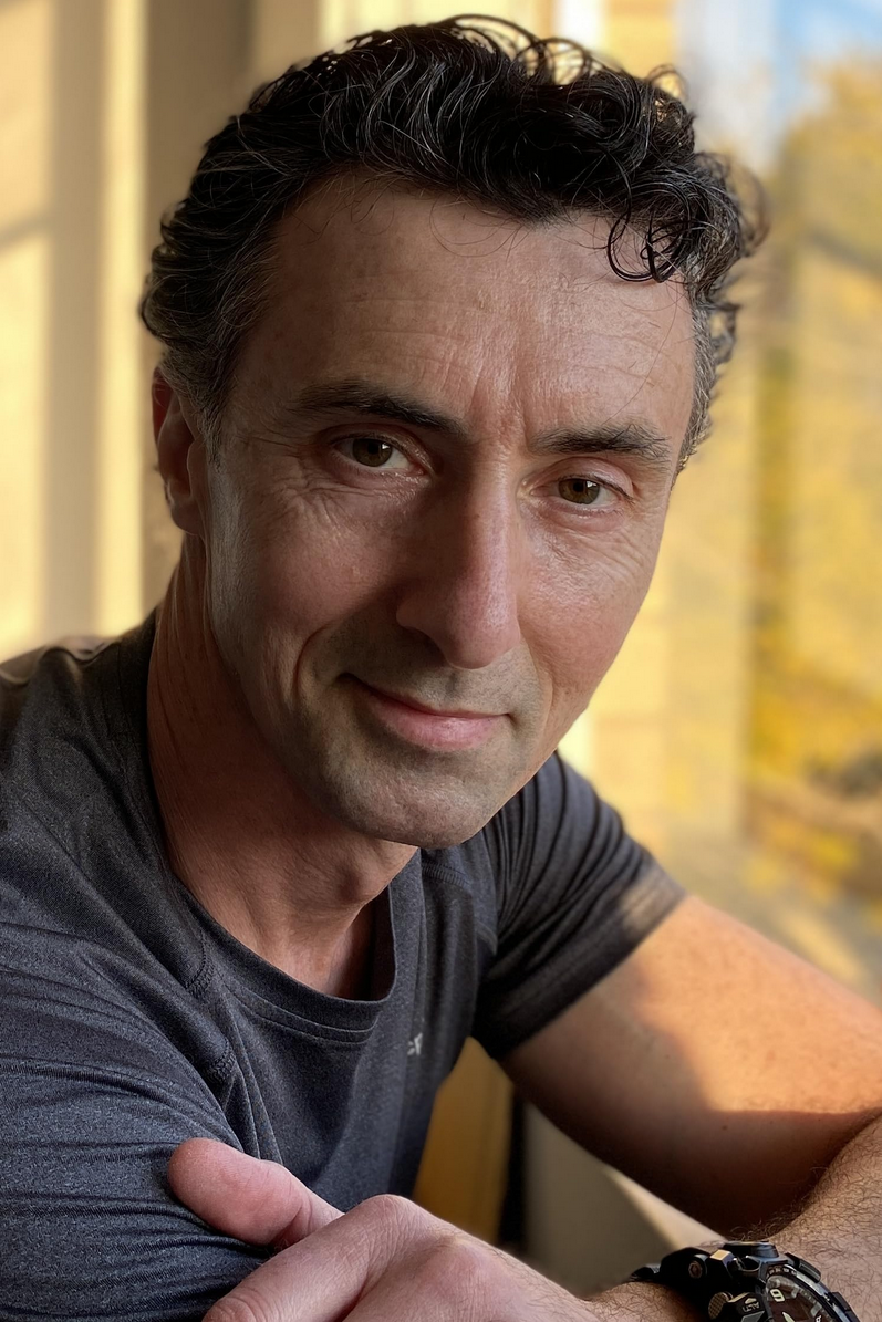 A picture of Ben Fransham, a man with dark wavey hair and clean shaven beard. Picture taken from:https://www.imdb.com/name/nm0291740/?ref_=tt_cl_i_6