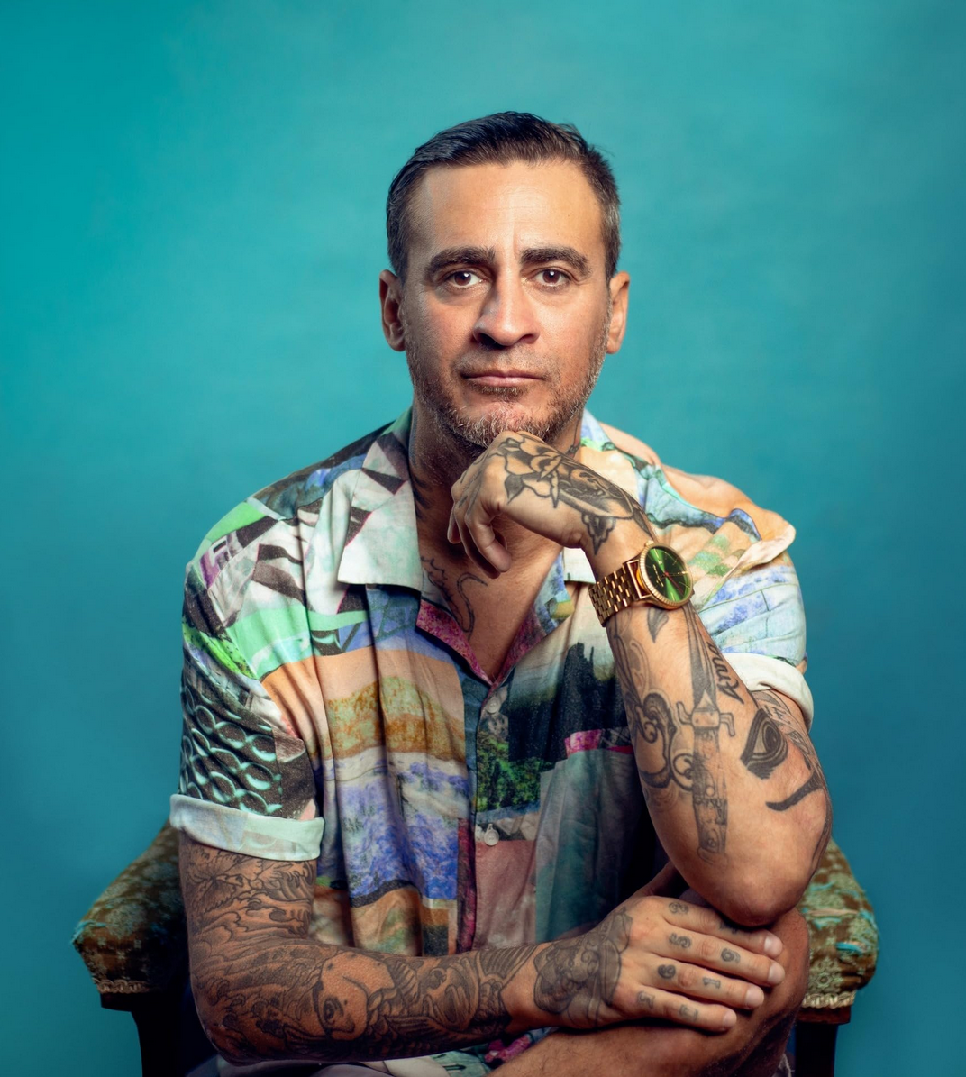 A picture of Cori Gonzalez Macuer, a man with short brown hair and tattoos. Picture taken fromhttps://www.imdb.com/name/nm1591353/?ref_=tt_cl_i_4